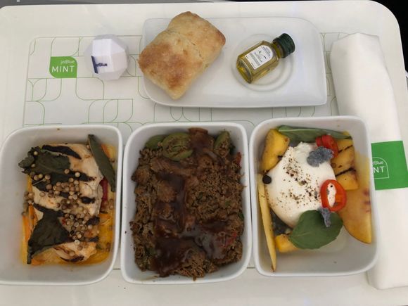 Miso barbecue chicken, braised beef and black bean rice, grilled peach and burrata salad