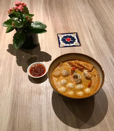 Laksa with prawns , quails eggs and scallops at 190 , FS 
