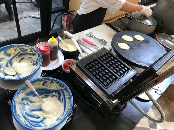 Fresh pancakes (serabi) and waffles