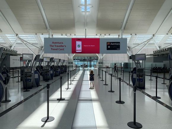 On Sunday afternoon we headed back to the airport. The check in area is of course, deserted. All of the active check-in desks were compressed into a single aisle.