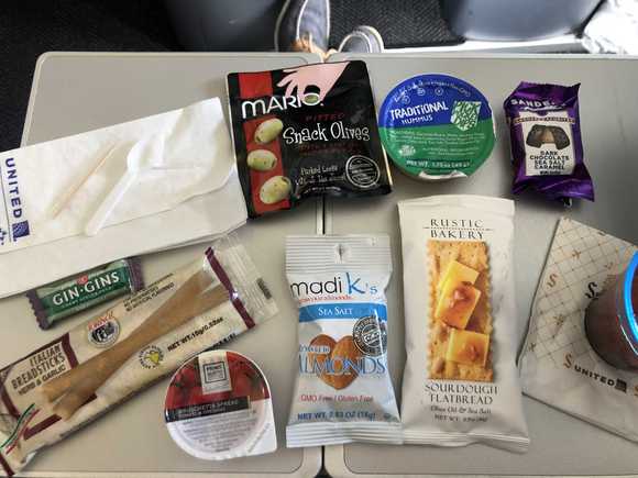 There was no doubt in my mind that I was going to pass on the blue label sandwich this leg. I opted for the Tapas box; everything you see here is fewer calories than a blue label sandwich.