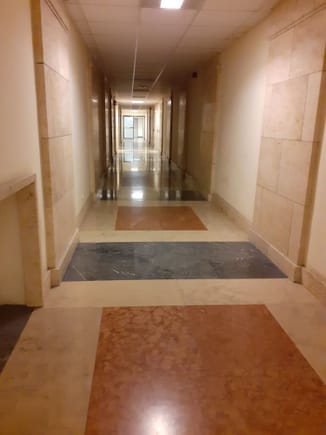 Airport corridor wth original flooring