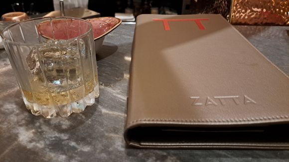 A Johnnie Walker Blue label whisky  with a huge ice cube in Zatta. Live band played 4 days a week for a few hours in the bar ( pretty good). Price reasonable for JW Blue ( Y3,500  before 25% diamond discount)