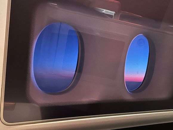 Sunrise flying over the UK into LHR. 