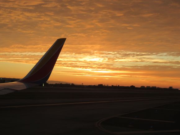 Colourful sky during taxi at SJC