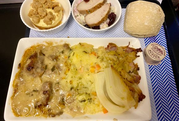 Pork and cider casserole, root vegetable hash, buttered savoy cabbage and bacon, fennel