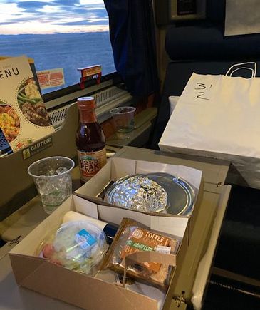 Dinner served just as the sun was setting, approximately 6:30 pm, 5.5 hours before arrival. 