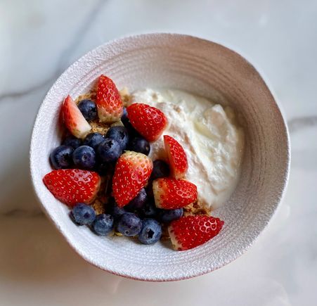 Granola with blueberries and strawberries 