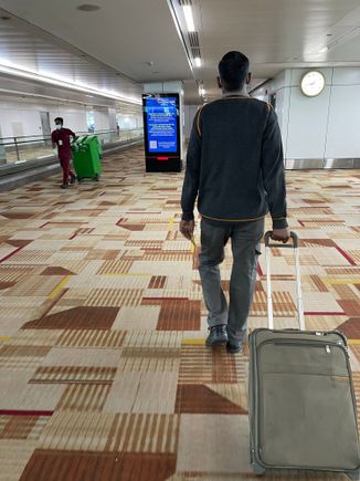 Passenger assistance for F pax at Delhi. We needed to get some stamps on exiting the plane and he was helpful in getting them.  Unsure what purpose it served. 