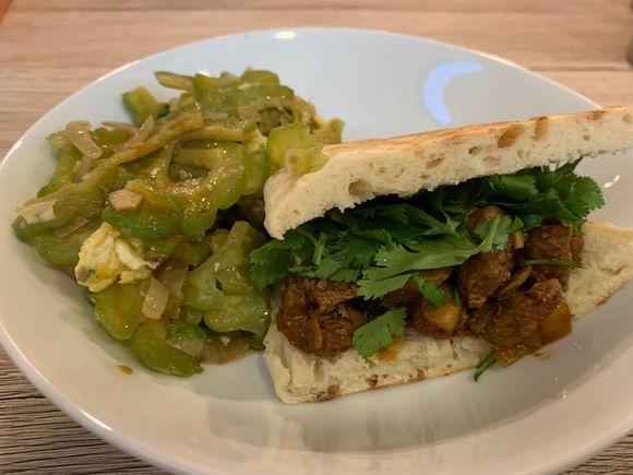 Homemade rou jia mo (肉夹馍) and bitter melon with egg.