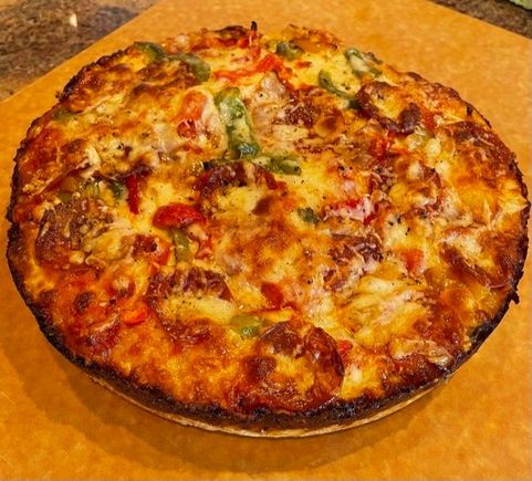 My first attempt with, you guessed it, Rao’s pizza sauce! 😂Multicolored peppers and pepperoni. I finally got the caramelization right on the crust and loosened it before it got stuck on! I’m pleased. 