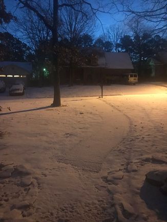 My front yard looking all pretty. Unfortunately there is ice under the snow.