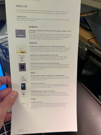 “Refreshed” wine list. I need to run these through Vivino to see if they crack $100. 

The blanc de blanc was quite good and a step up from the Cazanove (though not Palmes D’or; one can only hope), though only one bottle was catered for eight passengers… The alternative was the Prosecco. 