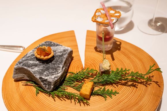 Chickpea Fritter, Salmon Caviar Tart, Mulled wine mousse with fried lotus root and sweet potato dusted with ume.