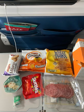 Mid-con Domestic F: FA came around to offer more of the Flight Fuel snack boxes later. This is the contents of the salami “Crave” box 