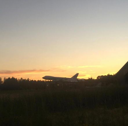 Sunset with the plane on the water park roof