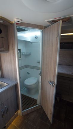 Toilet with shower and washing mashine
