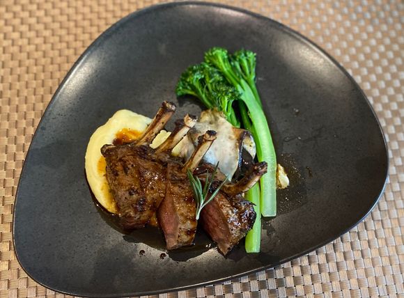 New Zealand lamb with eggplant , truffle mash and broccolini 