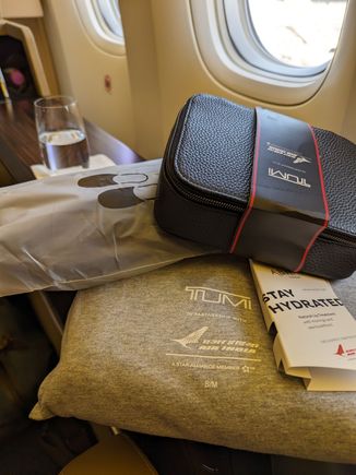 Headphones, pyjamas, amenity kit, lip balm (that they made a big fuss over)