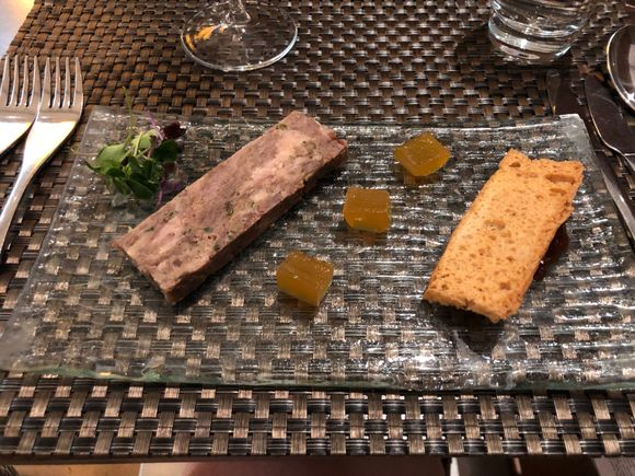 Cured venison and pork belly terrine with apricot jelly and baby herb salad