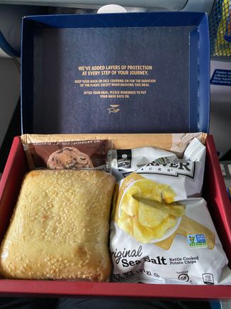 4” ham sandwich, chips, and sweet cookie 




