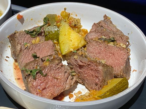 Flat iron steak - summer squash caponata (a traditional Italian dish of sautéed eggplant, vegetables, olives and onions)
Not bad, could use more of the accompanying caponata.


