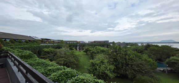 A view from the hotel rooftop near the spa towards the lake and the rest of the resort. Notice how green it is, and you can barely see the pool even though its 80m+ long.