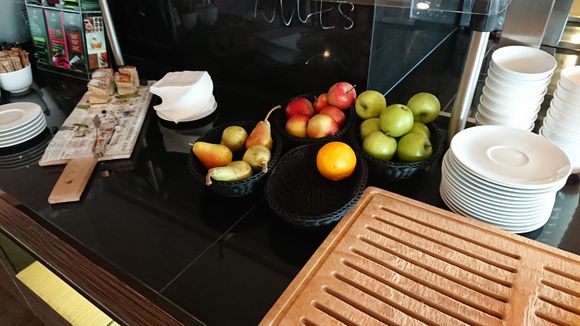 Cake and fruits during the day.
