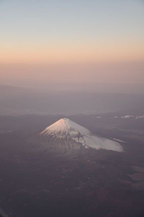 Mt Fuji taken from CX HND-HKG Dec 2019 just after dusk ( also a long haul  equipped 777 on that route rather than regional J so was in mini J cabin)