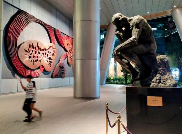 The foyer of a nearby high-rise building resembles an art gallery!