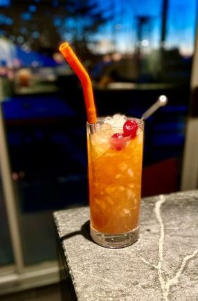 Nui Nui (1937 Version) - Rum (Demerara, Jamaican rum &cachaça), Orange and Lime juices, Cinnamon and Vanilla syrups, St. Elizabeth Dram and Jamaican bitters. 