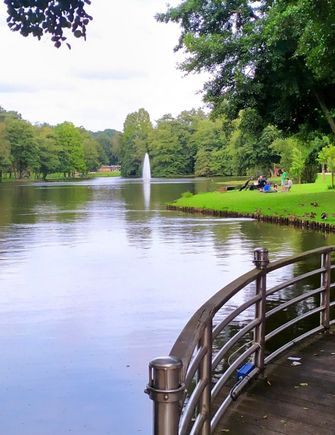 The Molenvijver lake in the town of Genk, in a pleasant park with cafés, restaurants and walkways