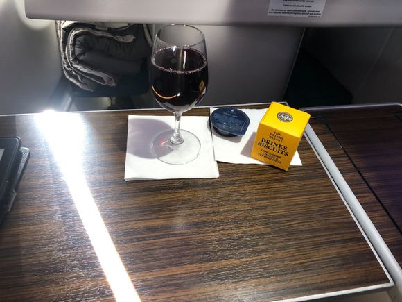 Starting with a box of savory crackers with onion jelly, and glass of wine