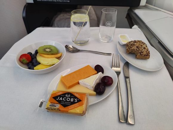 Cheese plate and fruit salad