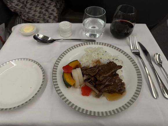 Main course at dinner LAX-SIN. Ginger Beef.
