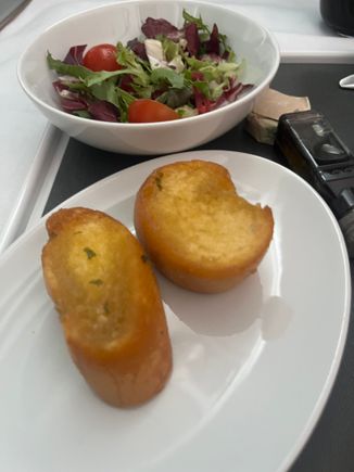Garlic bread on AC 857 yesterday. So hard that I didn't eat it to spare any consequent dental damage.  On the bright side, the nut ratio was quite good.  