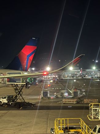 Winglet and tail of an A350 at E getting ready for the late evening departure to ICN. 