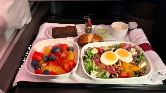 Arrival meal, chopped salad, green goddess dressing.  Fruit bowl and brownie.
