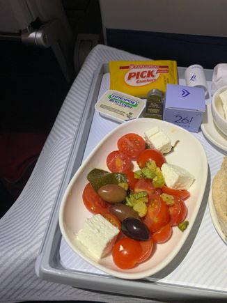 Greek salad, crackers, butter and 26th birthday chocolate