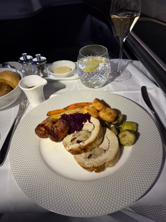 Christmas dinner - very nice, turkey was a little dry but all the accompaniments were great, much much better than the business class turkey dinner I’d had earlier in the month.