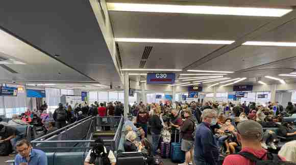 I had just arrived at C30 on a narrowbody 319 from IAD.  Exiting passengers had to run this scrum into the terminal hallway.

