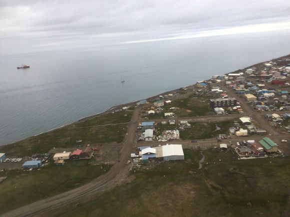 Take off aboard AS 50 over the Chukchi Sea at Utqiagvik. Off shore ships are a 48' sailboat, the One Ocean (https://oneislandoneocean.com/), on a circumnavigation of North and South America, and the Canadian Coast Guard icebreaking buoy tender Sir Wilfrid Laurier, which has been undertaking a mission to counter illegal, unreported, and unregulated fishing in the north Pacific, as well as support a Canadian-US science mission in the Bering and Chukchi seas. 