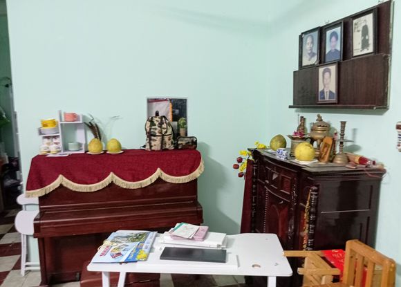 The piano is finally installed in the old French colonial house 