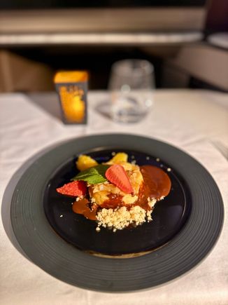 Lunch dessert - Warm salted caramel and almond cheesecake vanilla ice cream, hot fudge sauce and orange

Okay-ish 6/10 but continuous recurring theme of overly sweet and overly indulgent desserts on QR. Need more variety with lighter dessert options from time to time.
