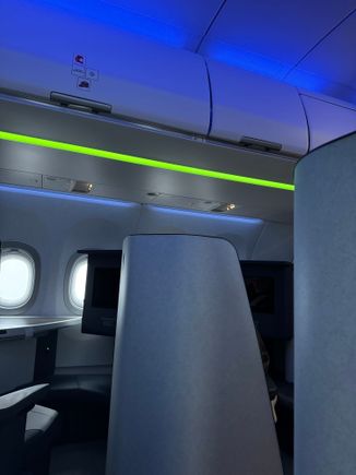 Mood-lighting fluctuated between blue and green during boarding 
