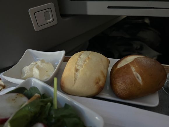 Three or four warmed bread options, also appreciate the whipped butter