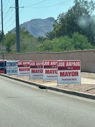 What is particularly annoying is that the signs are in Scottsdale. He’s not running here.
