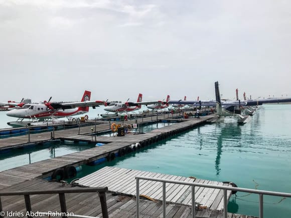 The Trans Maldivian Airways pier was very busy with seaplanes coming and going every few minutes. After a 15 minute wait, boarding was called and we walked all the way to the end of the pier where 8Q-TME, a DHC-6 Twin Otter Floatplane was waiting for us. You can check out my flight video report to get a birds-eye view of the boarding process as well as the entire flight.