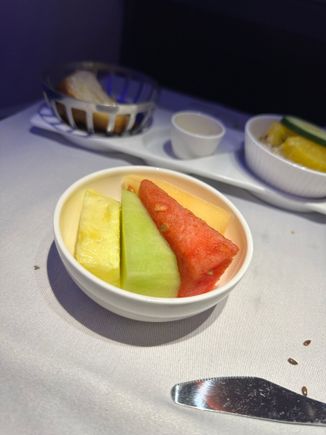 The cheese is preplated with nuts, which im allergic to. And with no allergy info out of hong kong i was left with fruit, which im pretty sure came from the WTP cabin.