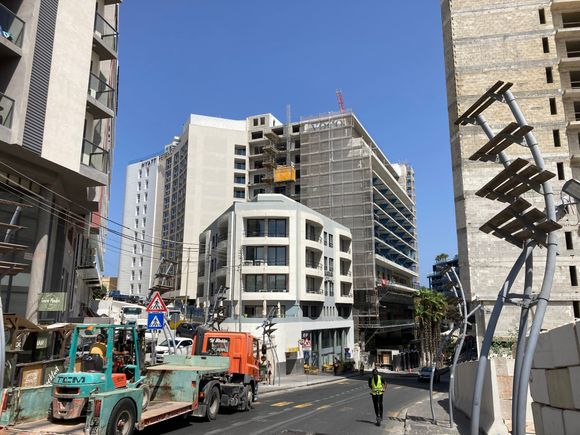 A view from street level: forefront left: Hyatt Centric, middle left: Hyatt Regency Middkle Right Voco
